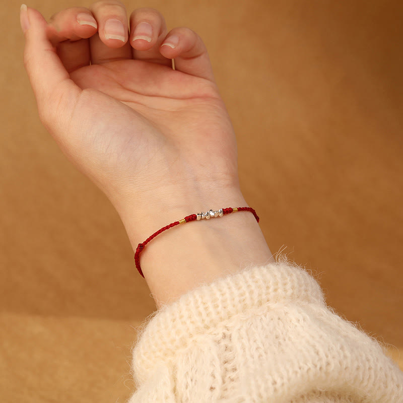 Unisex-Schutzarmband aus 925er Sterlingsilber mit roter Schnur