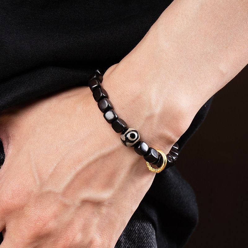 Unisex Balance-Armband aus Ebenholz und Dzi-Perlen, 7 mm