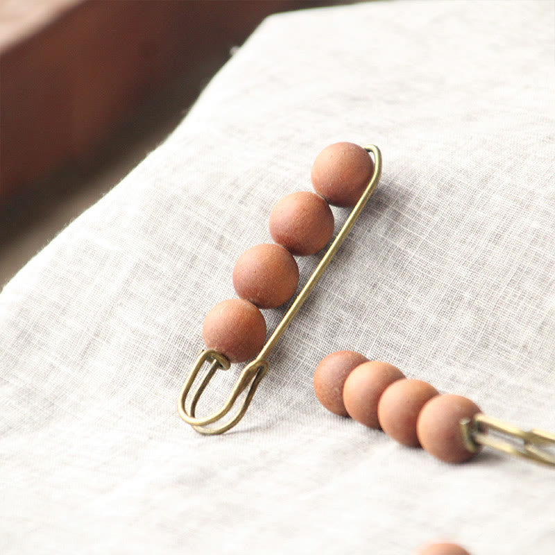 Heilbrosche aus Holz mit Sandelholz-Agathis-Alba-Perlen