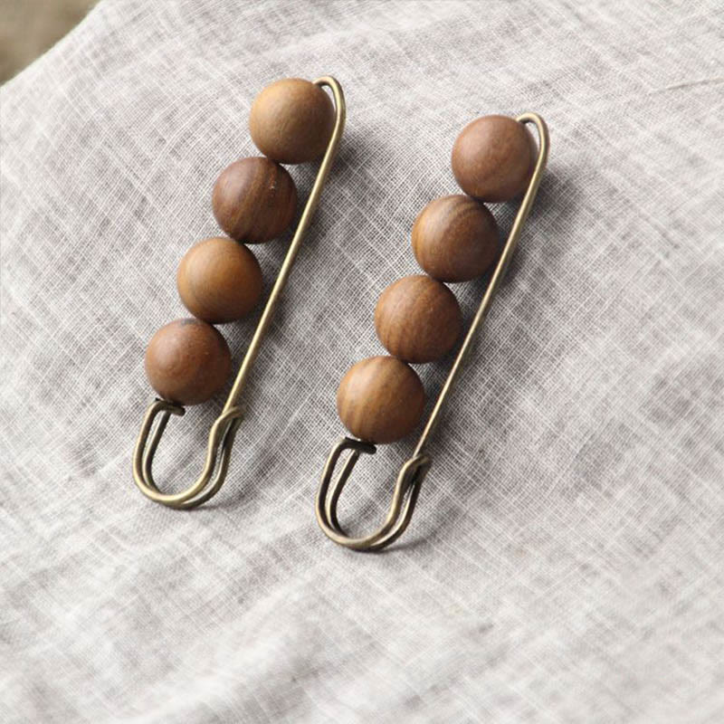 Heilbrosche aus Holz mit Sandelholz-Agathis-Alba-Perlen