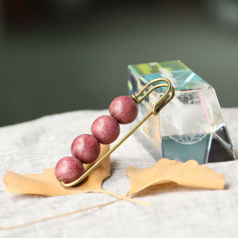 Heilbrosche aus Holz mit Sandelholz-Agathis-Alba-Perlen