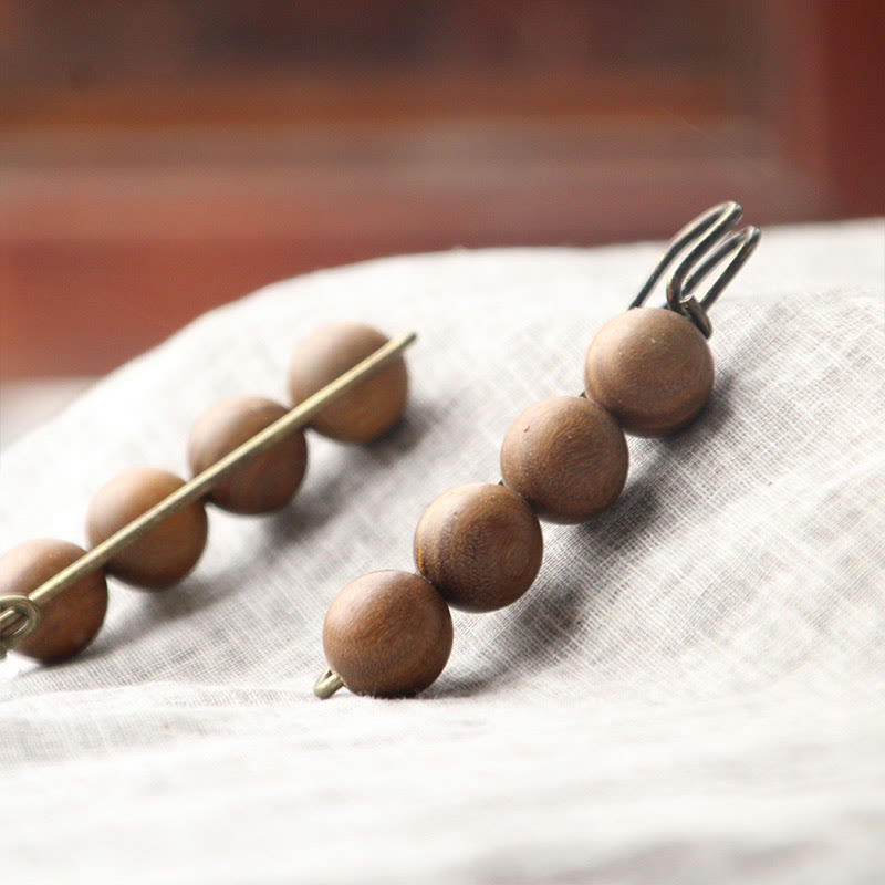 Heilbrosche aus Holz mit Sandelholz-Agathis-Alba-Perlen