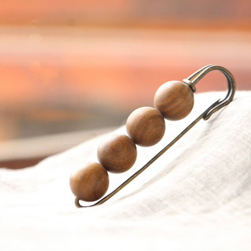 Heilbrosche aus Holz mit Sandelholz-Agathis-Alba-Perlen