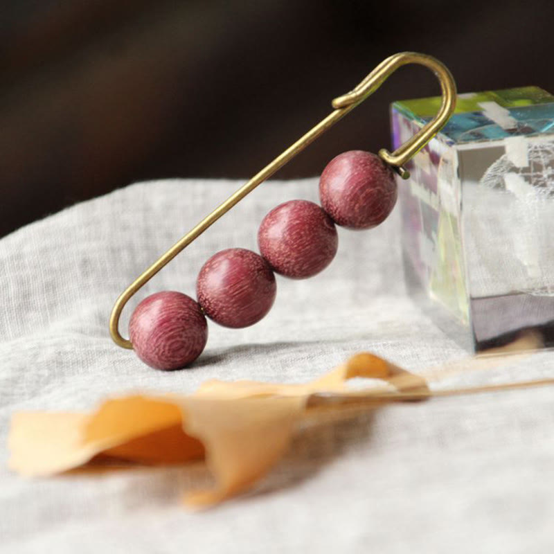 Heilbrosche aus Holz mit Sandelholz-Agathis-Alba-Perlen