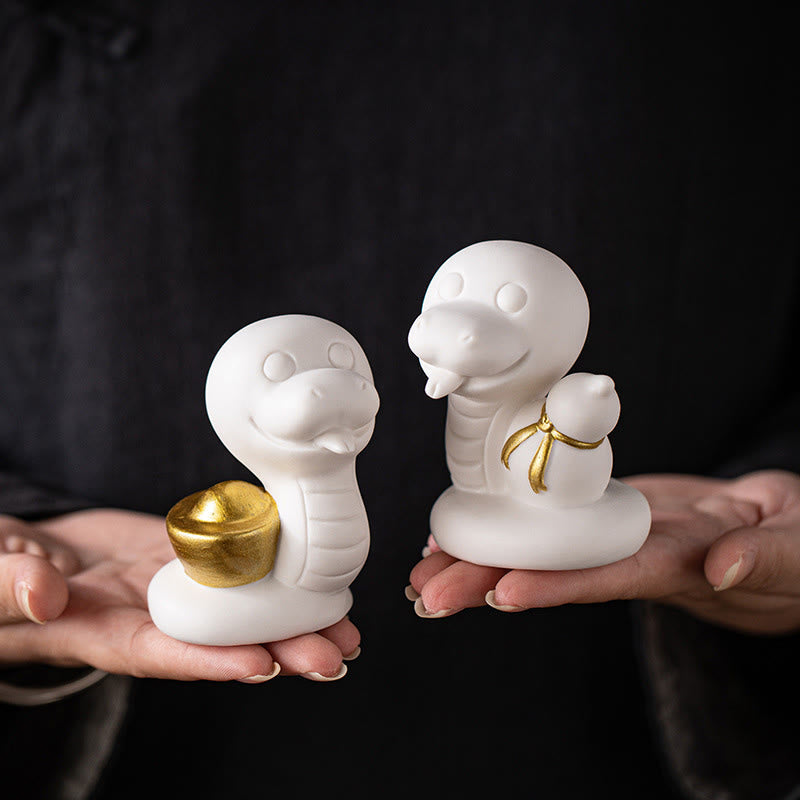 Keramikfigur aus Kürbis und Barren zum Jahr der Schlange