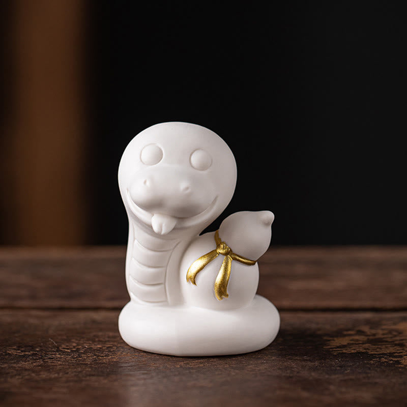 Keramikfigur aus Kürbis und Barren zum Jahr der Schlange